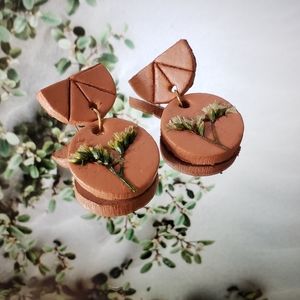 Handmade terra cotta earrings with real flowers